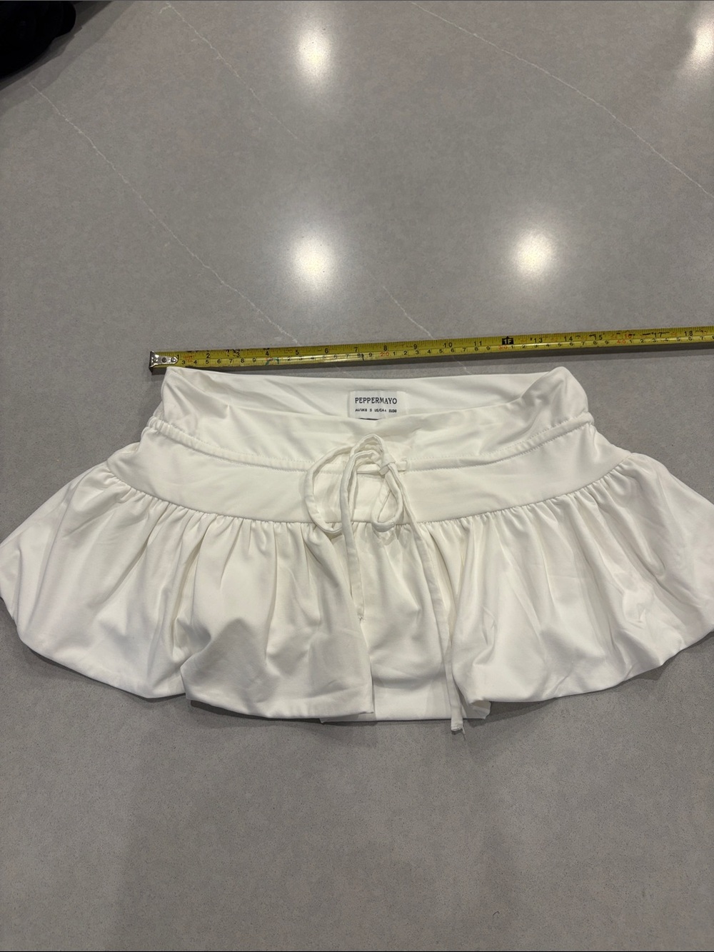 Peppermayo White Ruffle Mini Skirt with Drawstring